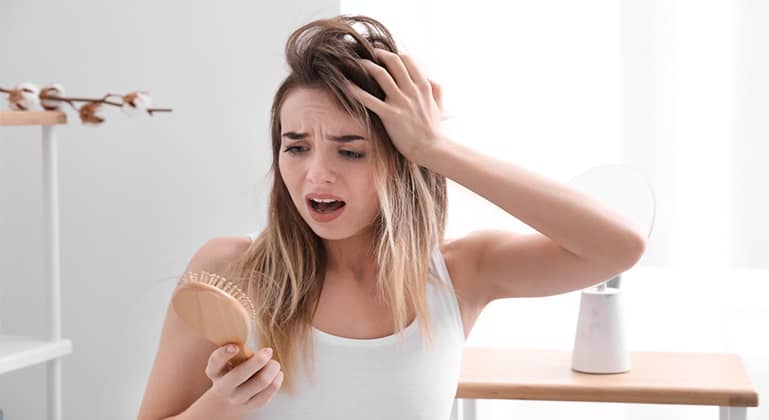 Hair Loss in Women: Causes, Treatment & Prevention | Hair Loss in Women